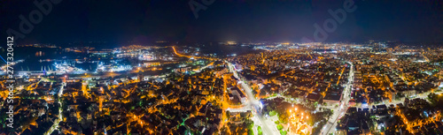 Beauty illuminated at night, a panoramic aerial view to streets in Varna, Bulgaria. Top view