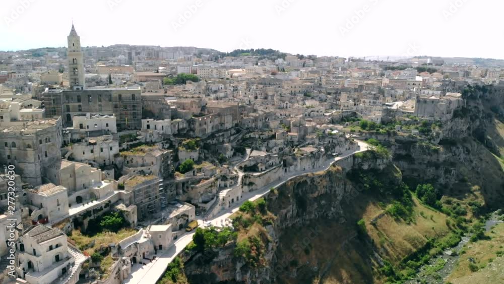 Aerial view of ancient town of Matera Sassi di Matera in sunny day, Basilicata, southern Italy Aerial view of ancient town of Matera Sassi di Matera in sunny day, Basilicata, southern Italy
