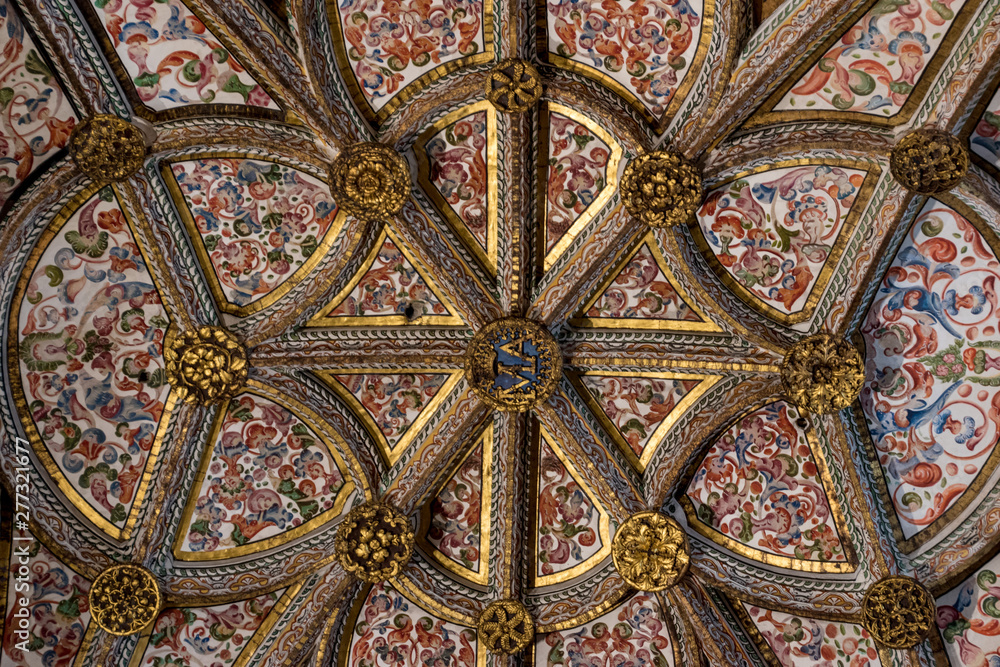 Looking up at the hand painted and carved Cathedral of Segovia, Spain