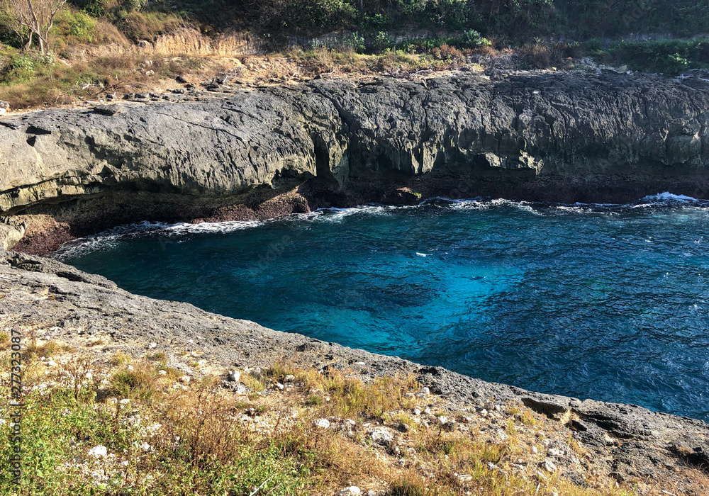 Blue lagoon on the island of Nusa Penida  in Indonesia, the rocks and the clear ocean