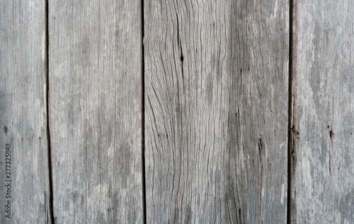 Old grey wood texture background. Wood plank abstract background. Empty weathered wooden wall. Surface of grey wood with nature pattern. Distressed and simplicity background. Vintage wooden floor.