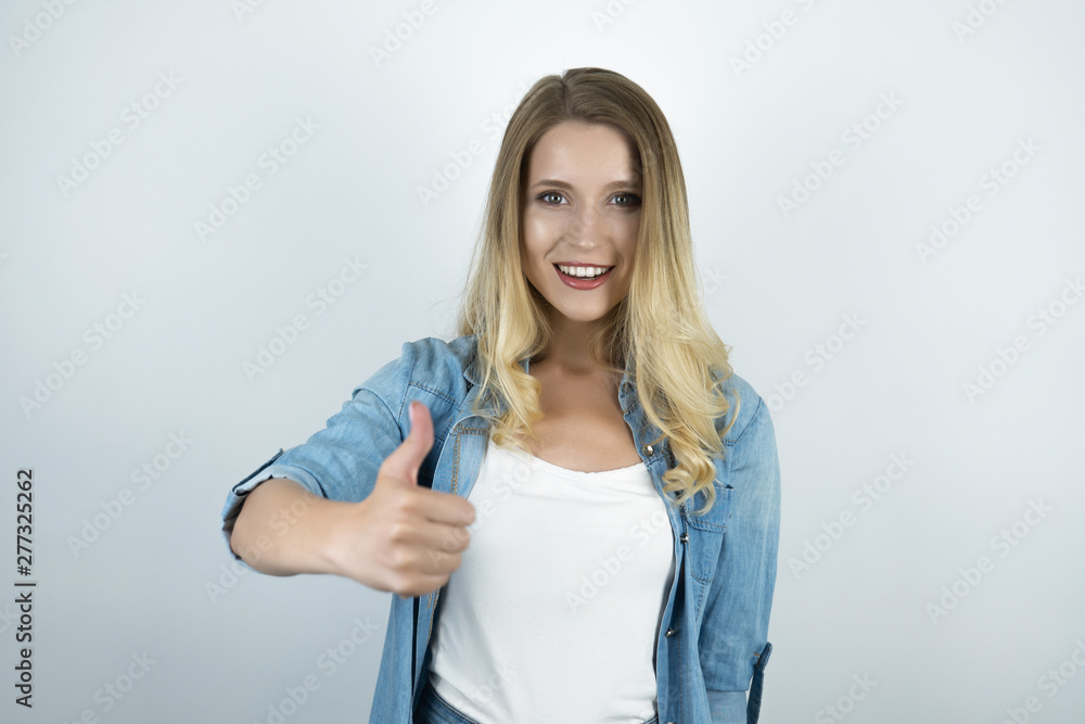 blond woman showing ok sign white background blond woman showing ok sign white background