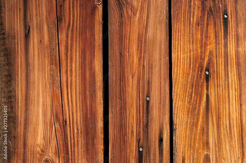 Fototapeta premium Vertical Weathered Hardwood Boards with Snags, Metal Nail Heads and Gaps.