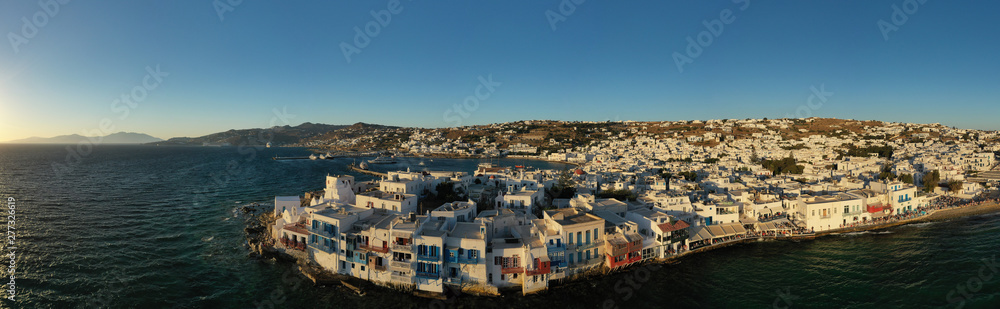 Aerial drone photo of iconic colourful white washed and picturesque little Venice in main town of island of Mykonos, Cyclades, Greece