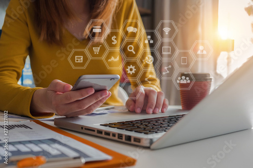 businesswomen working with smart phone and laptop and digital tablet computer.