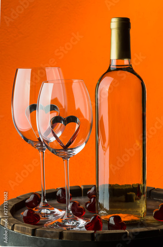 Still life with red wine and heart photo