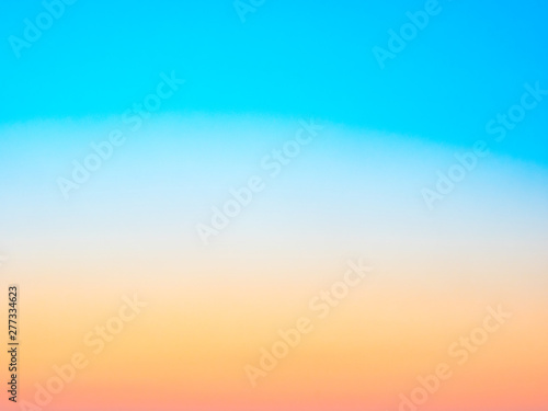 Abstract blurred blue, yellow and orange background. Summer concept