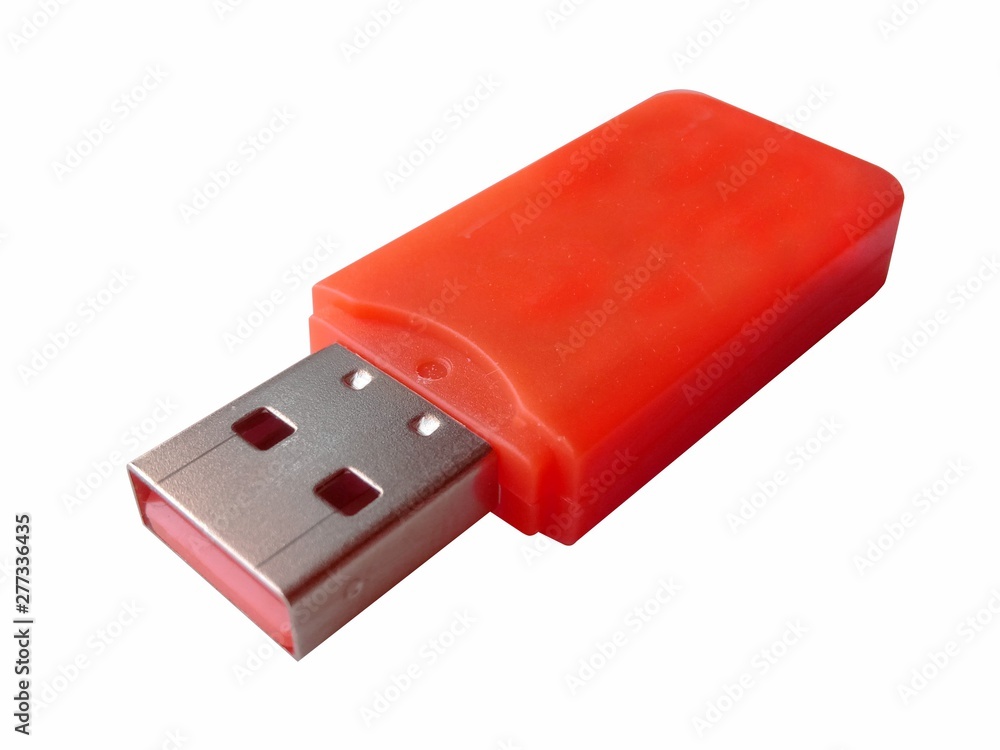 Red plastic USB flash drive isolated on white Red plastic USB flash drive isolated on white