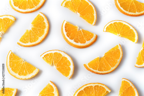 Orange fruit slices isolated on the white background