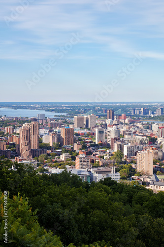 Montreal city skyline view from Mount Royal on a sunny summer afternoon in Quebec, Canada