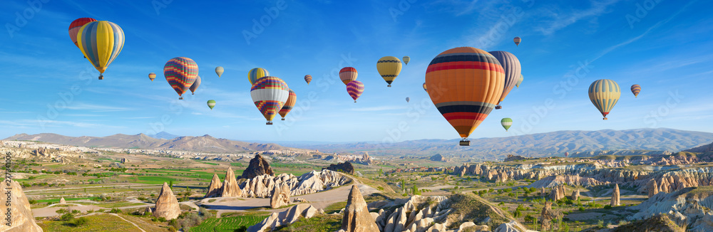 Panoramic view of unusual rocky landscape in Cappadocia, Turkey.