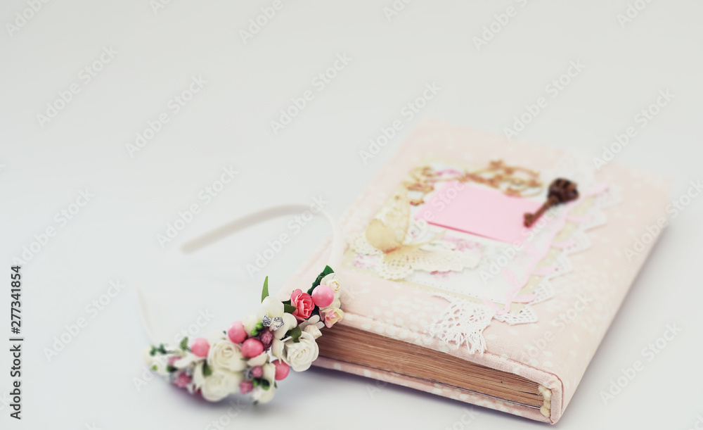 A diary for entries on a white table A diary for entries on a white table