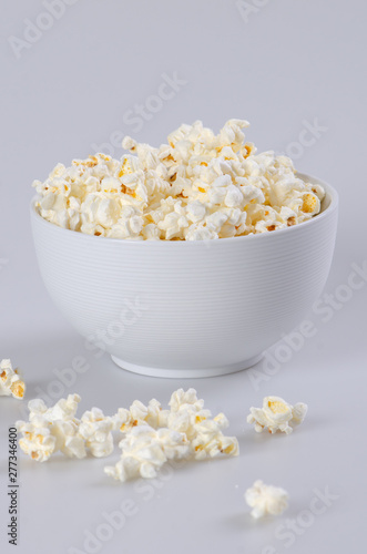 White ceramic bowl filled with popcorn