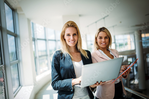 Picture of attractive sales workers on meeting in office