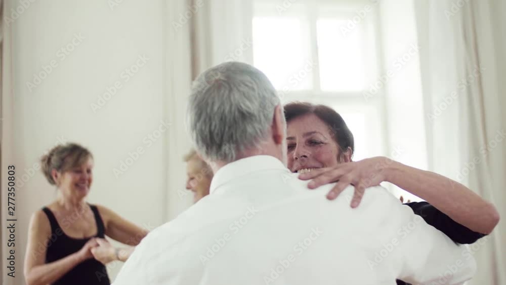 Group of senior people in dancing class with dance teacher. Group of senior people in dancing class with dance teacher.