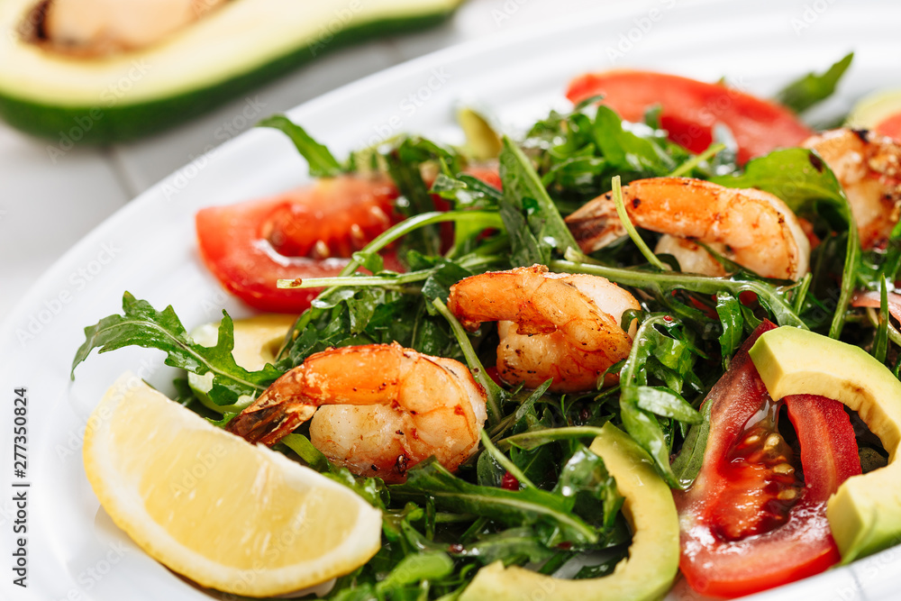 Shrimp Salad With Avocado Garden Rocket Leaves. Fresh Prawn Vegetable Appetizer Tasty Organic Aragula Seafood Vegetarian Dish. Diet Gourmet Low-fat Restaurant Menu Dinner Plate Close-up Flat Lay Shrimp Salad With Avocado Garden Rocket Leaves. Fresh Prawn Vegetable Appetizer Tasty Organic Aragula Seafood Vegetarian Dish. Diet Gourmet Low-fat Restaurant Menu Dinner Plate Close-up Flat Lay