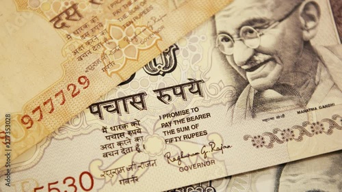 Wallpaper Mural Mahatma Gandhi close up Indian currency 10/50/100 Indian rupees. Pedestal down shot Torontodigital.ca