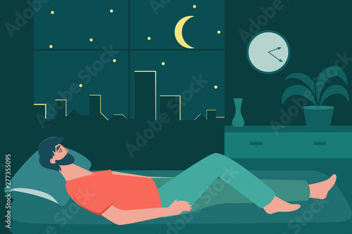 Male insomniac lying in bed at night. Tired man suffer from sleeping disorder, insomnia, nightmare, sleeplessness. Sleepy character trying to fall asleep with room and city on background.