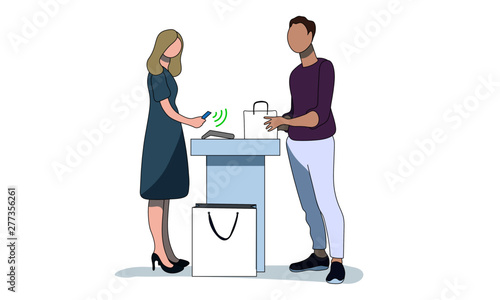 Woman making a cashless payment in a shop