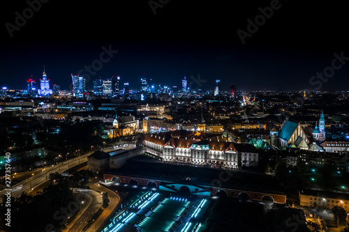 Great panoramic night view of the center and the Old City of Warsaw - Stare Miasto - from the right bank of the Vistula River. Palace of Culture City center. Aerial © netsay