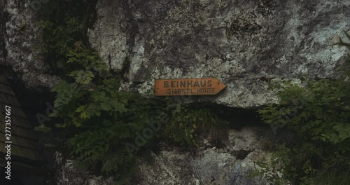 A label stating the direction of the famous charnel house in Hallstatt. photo