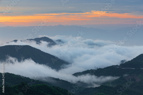 Mountain view on the morning with sea of fog and sunrise light.