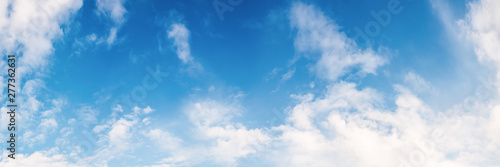 Fototapeta Naklejka Na Ścianę i Meble -  White clouds on a blue sky as background
