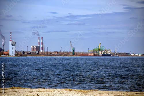 Industrial area by the sea. Trade export importIndustrial area by the sea. Power plant. Trade export import © kolyadzinskaya