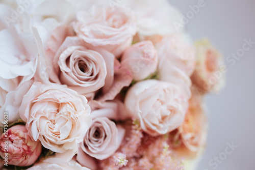 Wedding flowers, bridal bouquet closeup. Decoration made of roses, peonies and decorative plants, close-up, selective focus, nobody, objects