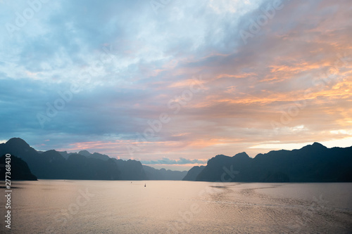 Halong bay and evening clouds on the sunset