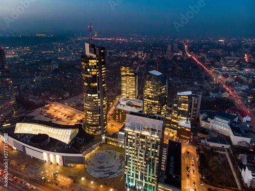Vilnius city night aerial view - Lithuanian capital by bird eye.