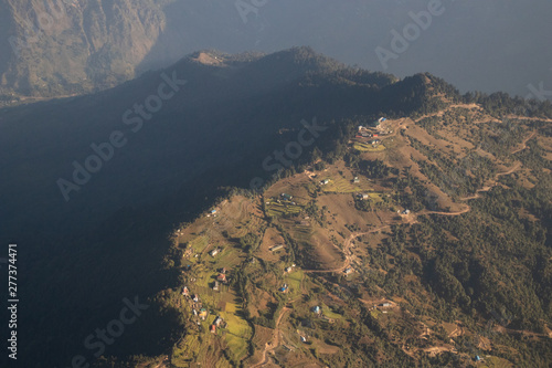 Aerial view of himalaya mountain range from airplane before landing at Kathmandu airport photo