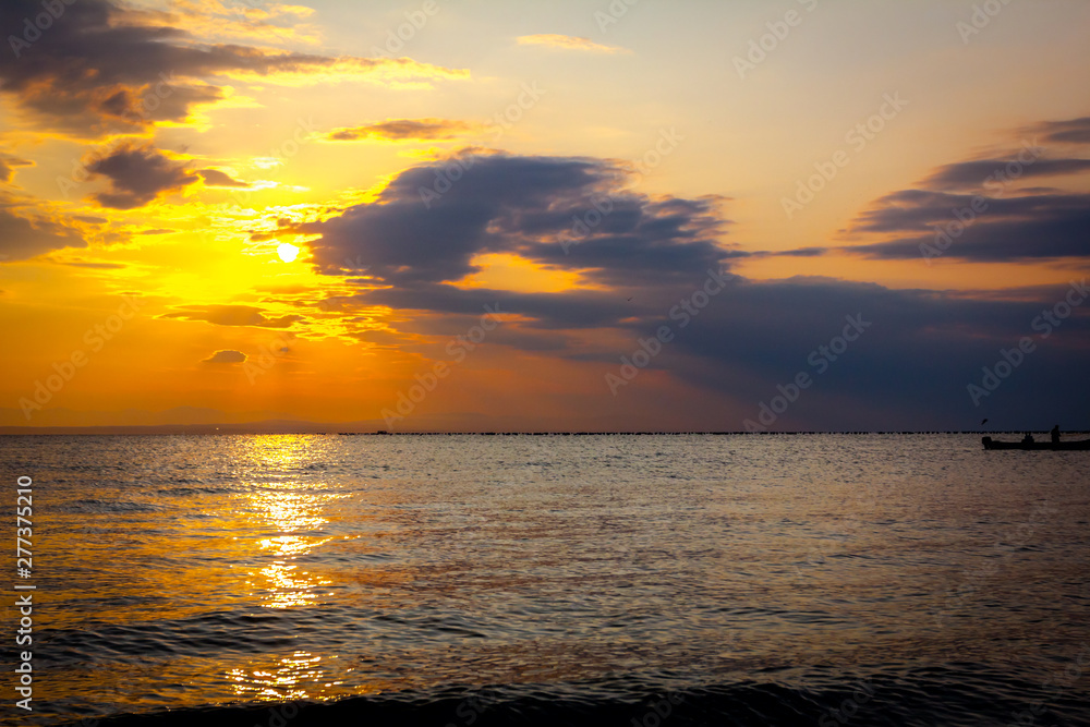 Fototapeta premium Fishing boat is passing over sea and going on the morning fishing.