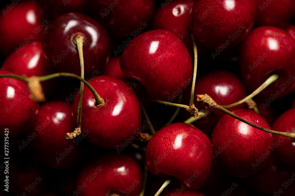 close up view of red tasty and ripe cherries close up view of red tasty and ripe cherries