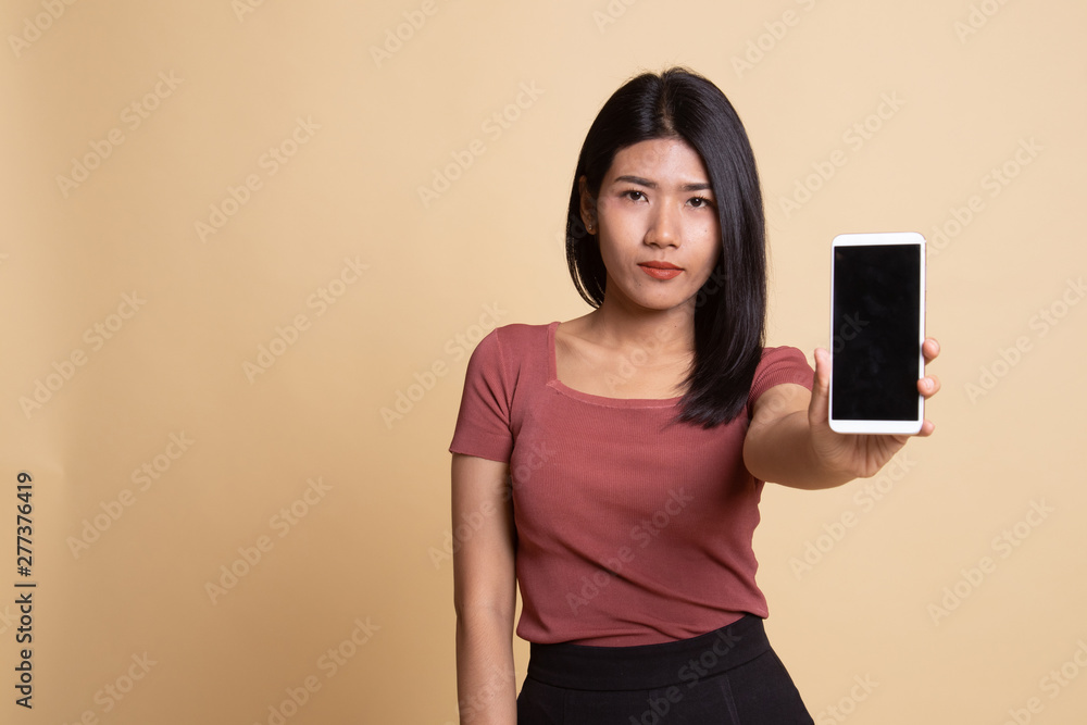 Fototapeta premium Young Asian woman with mobile phone.