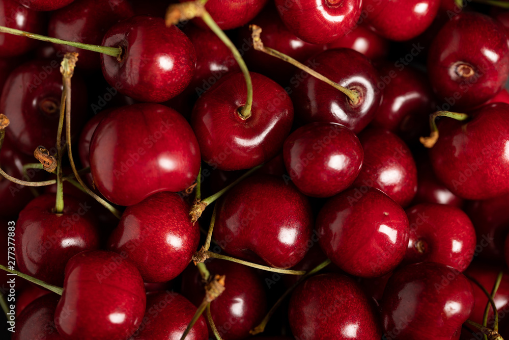 top view of red delicious ripe shiny cherries top view of red delicious ripe shiny cherries