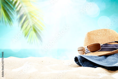 Summer background of sand with sea and coconut palm 