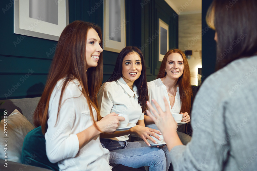 Chatting women drinking tea at home Chatting women drinking tea at home