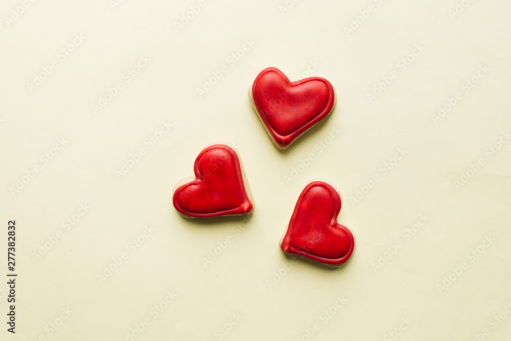 Cookies in heart shape with red glaze Cookies in heart shape with red glaze