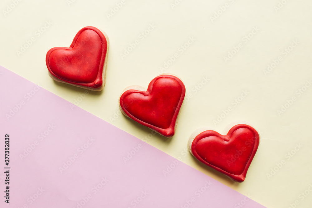 Cookies in heart shape with red glaze Cookies in heart shape with red glaze