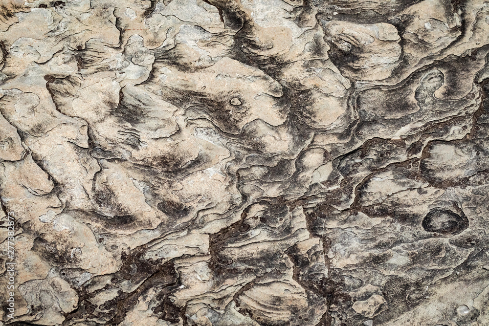 Aged Rock formation background and wallpaper.