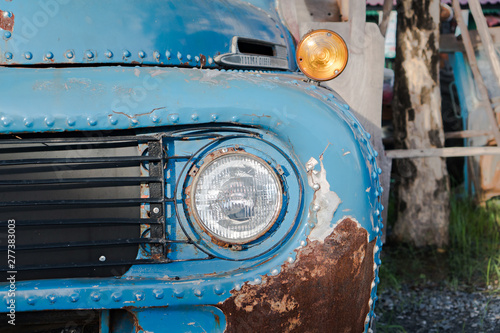 Rusty old car, selective focus (detailed close-up shot)