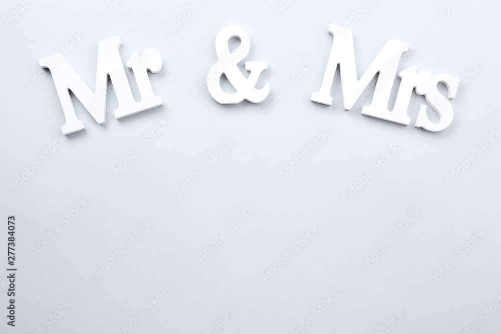 White letters Mr and Mrs on grey background