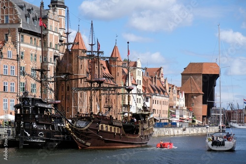 Fototapeta Poland, Gdansk - galleon ships and other boats by the bank of Motlava canal in O