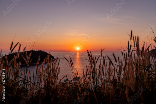 Beautiful sunset on Andaman sea at Windmill View Point near Laem Promthep Cape  Phuket  Thailand