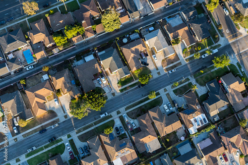 Aerial view of residential rooftops, streets and alleys in Los Angeles County California. photo
