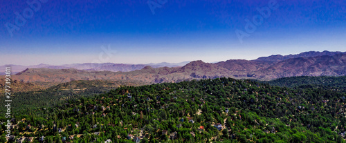Aerial, panoramic, drone view of the high desert near Apple Valley and Hesperia from the San Bernarindo Mountains near Lake Arrowhead, California