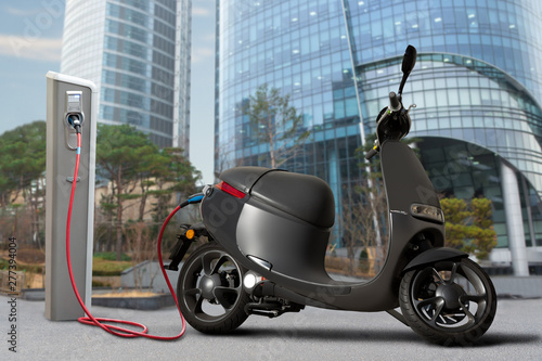 Murais de parede Electric scooter for sharing with charging station on a city street