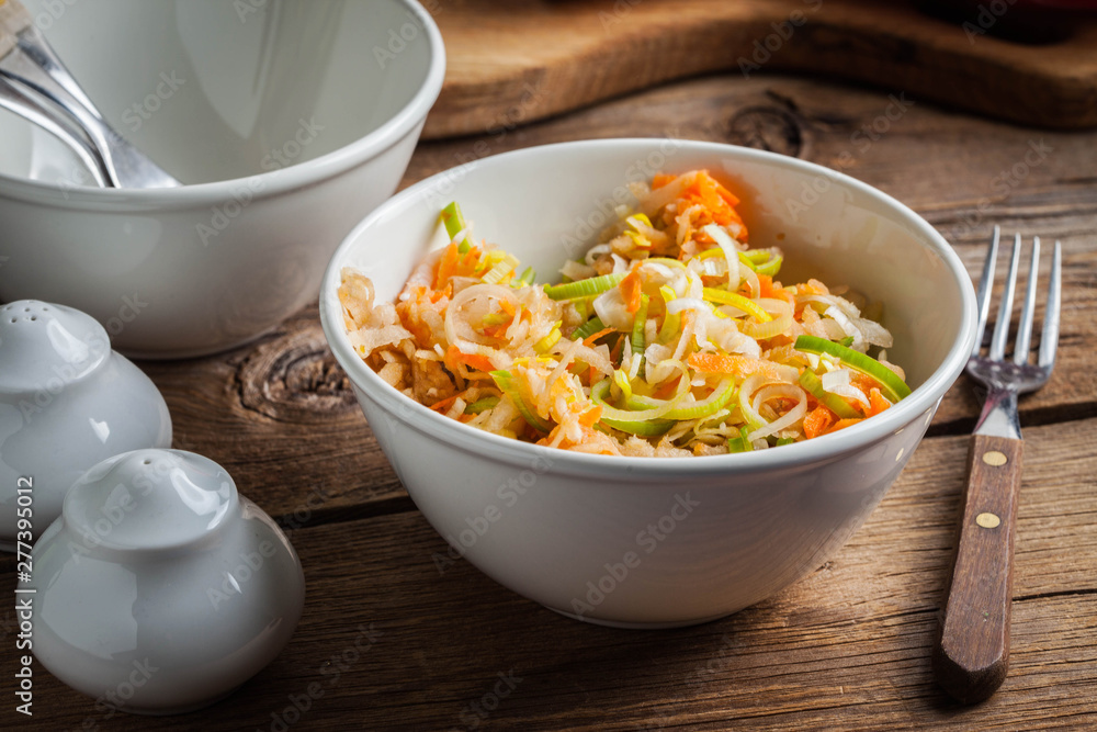 Salad with leek, carrots and apples. Salad with leek, carrots and apples.