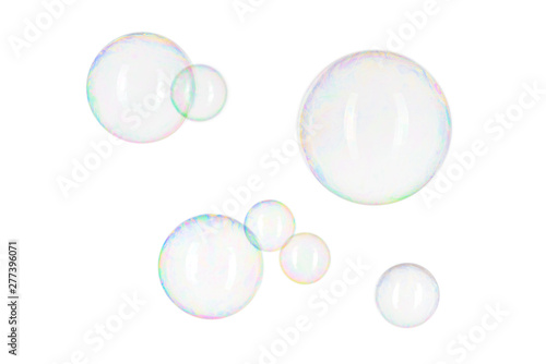 Realistic bright soap bubbles isolated on white background